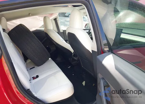 2023 Tesla Model Y Awd/Long Range Dual Motor All-Wheel Drive z USA, uszkodzony, nr VIN 7SAYGDEE3PF616185